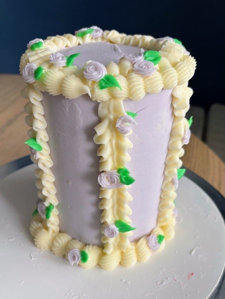 Lavender ruffle cake with mini roses